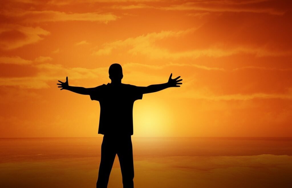 sunset, boy, open arms-110305.jpg